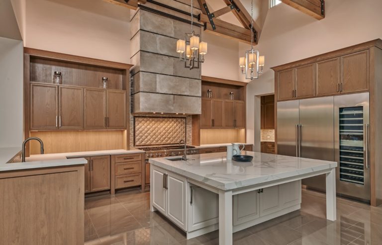 gray and tan colored large gourmet kitchen