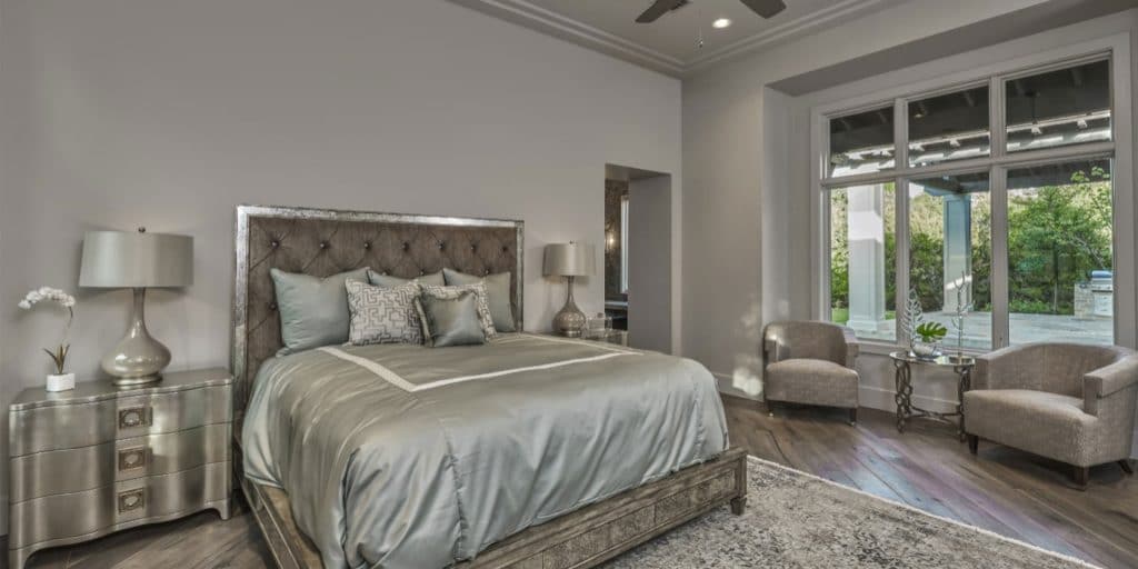 Bedroom with gray furnishings at Bluff Edge